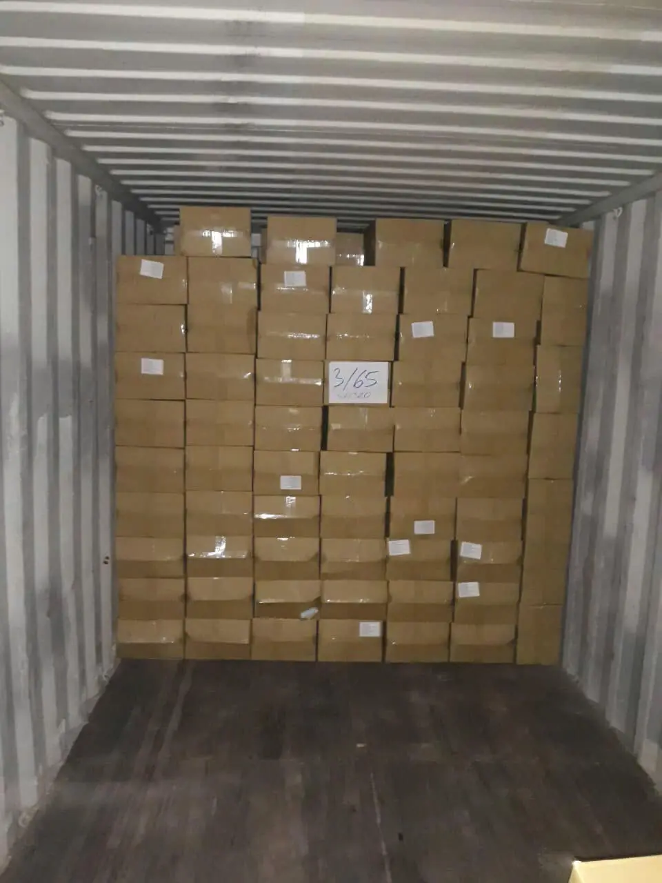Cartons of cashew kernels loaded in a container