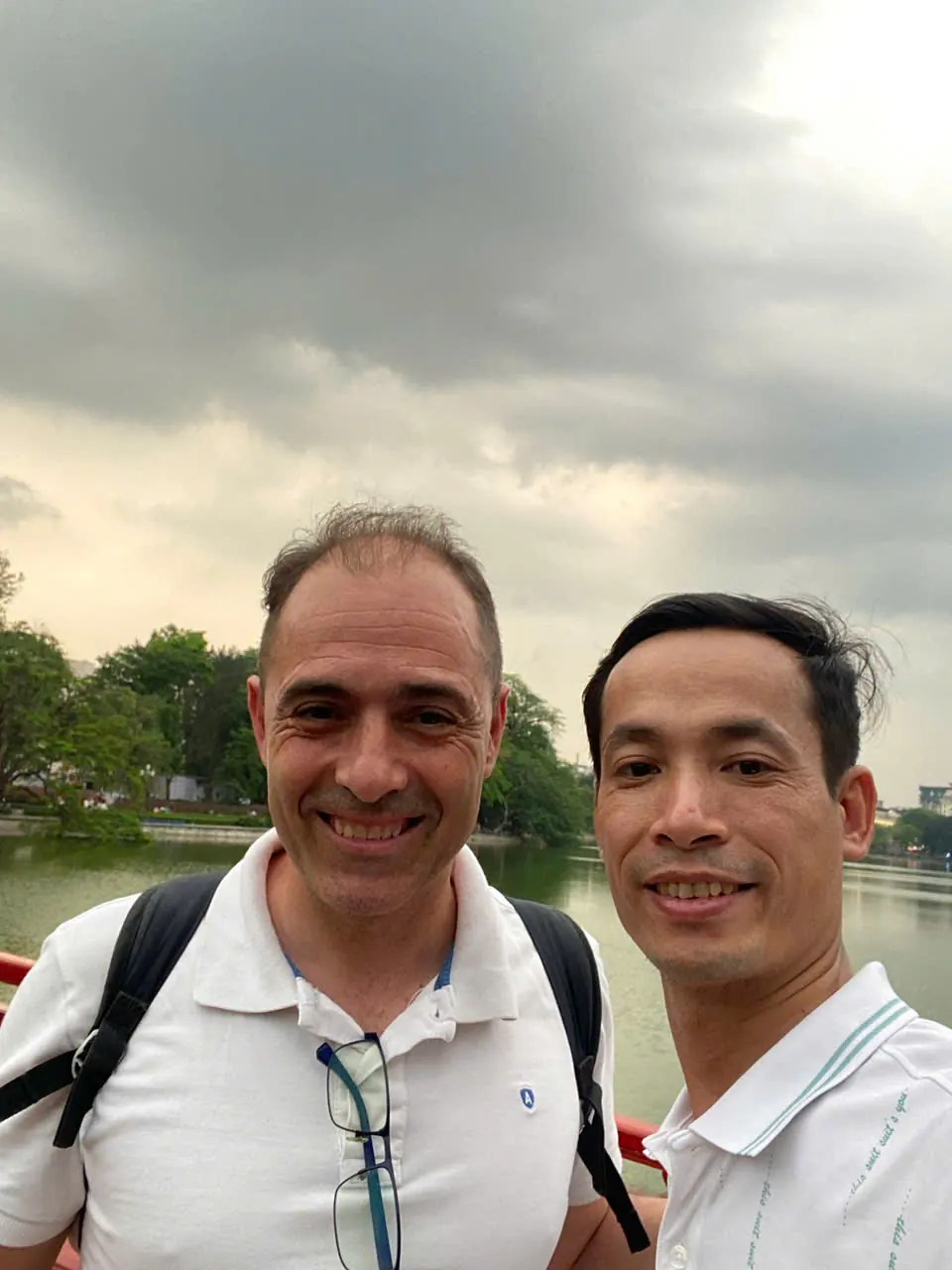 Our team with a visiting buyer by Hoan Kiem Lake, Hanoi
